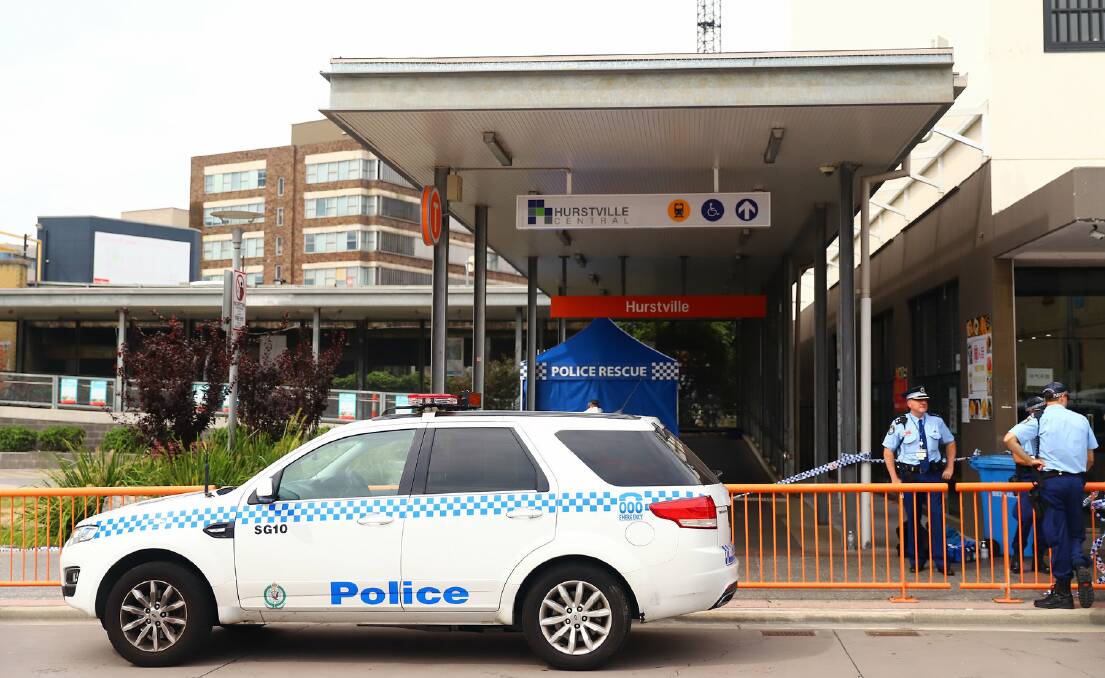 The crime scene near the entrance to Hurstville station where a man in his 50s was fatally stabbed. Pictures: Fiona Morris 