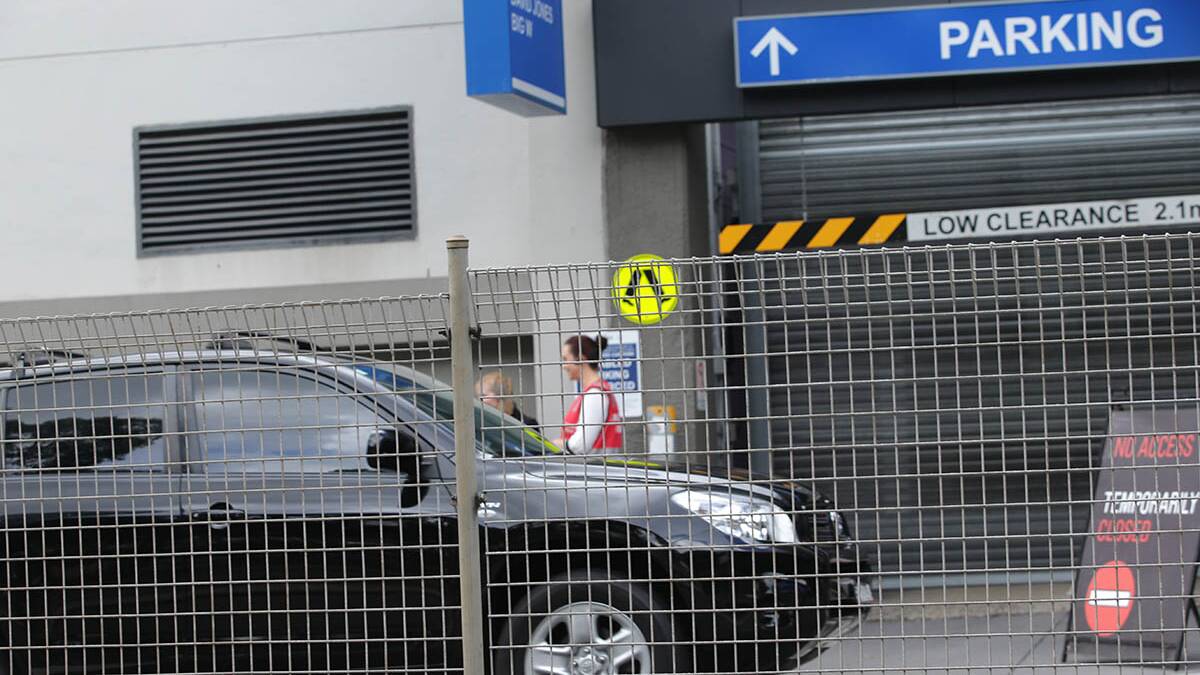 Access to one of Westfield Miranda's car parks was temporarily closed while the car was being removed from the scene.