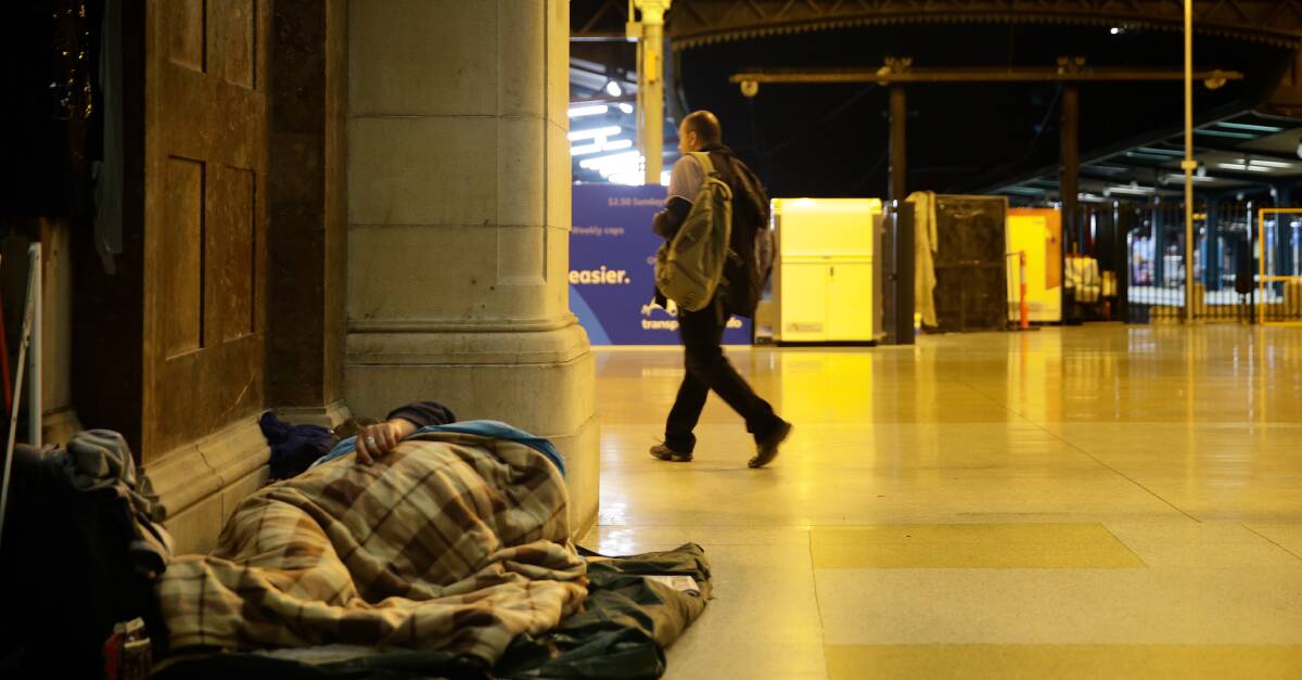 Sleeping rough: A homeless man takes shelter at Central station. War veterans make up about 10 per cent of the homeless in Sydney and Parramatta. Picture: Wolter Peeters 