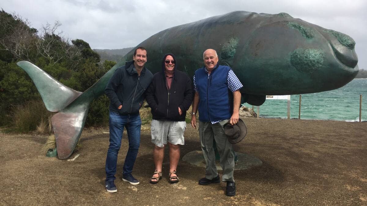 Having a whale of a time in Tasmania: (from left) Thad King, John Algeo and Hank Laan in front of the whale sculpture by artist Stephen Walker.