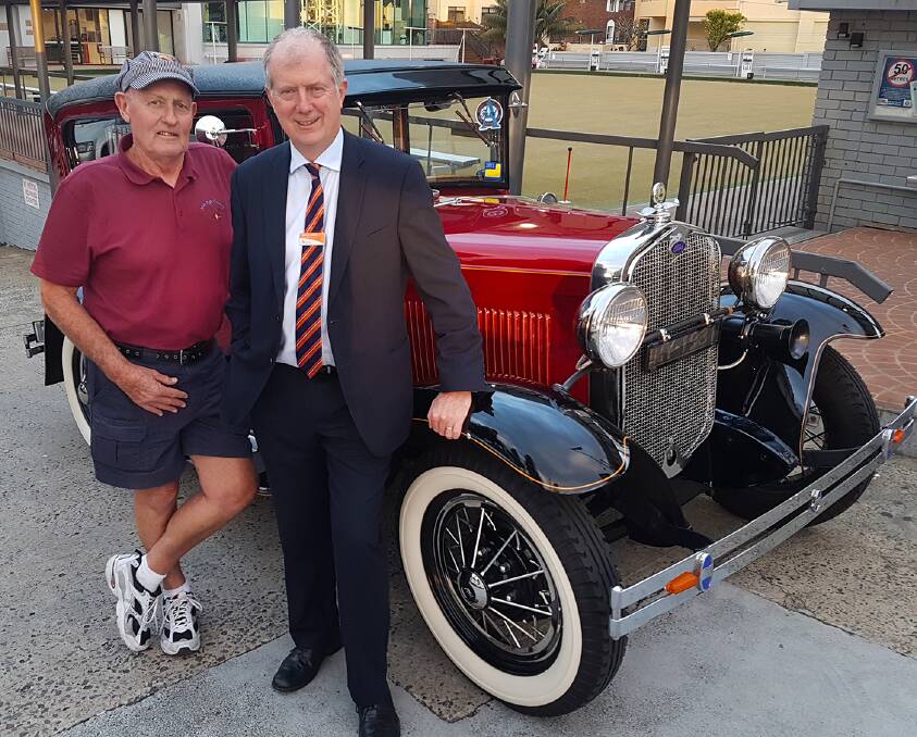 Big day out: Car and bike show director, Ken Warburton, with CEO of Sydney Trains, Howard Collins (right). Picture: Steve Core