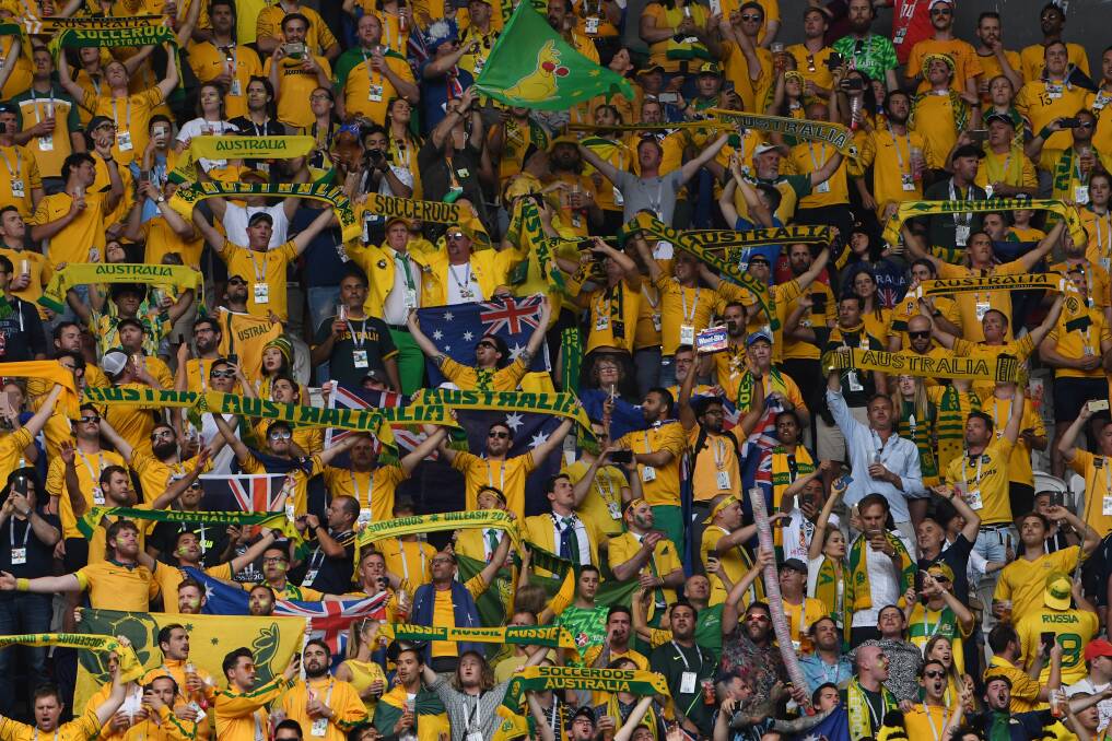 No lack of support: When the Socceroos walk out onto the pitch against Peru they will definitely get a lift from the sea of gold and vocal support within the stadium. More than 6,000 travelling fans were in the Samara Arena for the game against Denmark. Picture: Dean Lewins, AAP