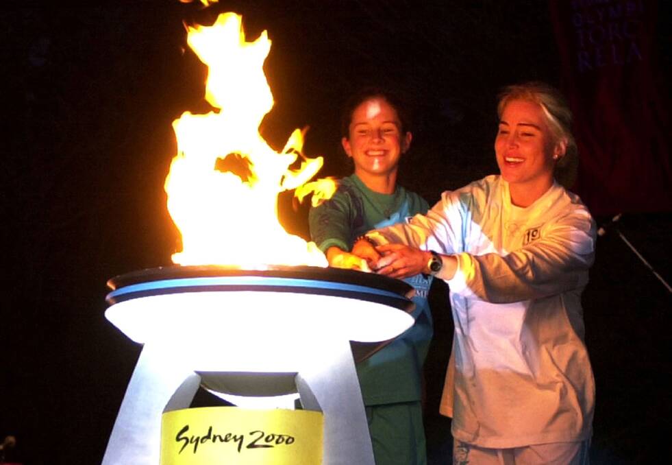 A crowd of more than 30,000 roared in 2000 when Susie Maroney carried the Olympic torch into Tonkin Oval, Cronulla, and with the aid of support runner Stacey Thomson from Cronulla High, lit the community cauldron.