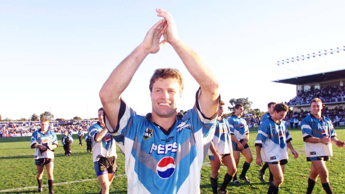 Milestone: ET salutes the crowd after playing in his 300th game for the Sharks against Manly. Picture: Dallas Kilponen
