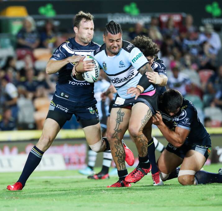 Cowboys captain Johnathan Thurston reached the 300-game milestone in style on Friday night, leading his team to a nail-biting 20-14 defeat of the Cronulla Sharks. Pictures: AAP