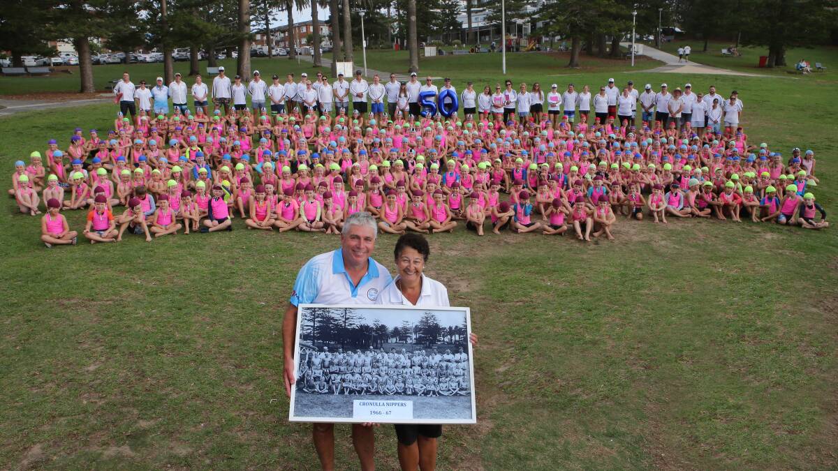 50 years: Cronulla Crays secretary Bob Sagar and chairperson  Michele Cole with the original's and their current brood. Picture: John Veage