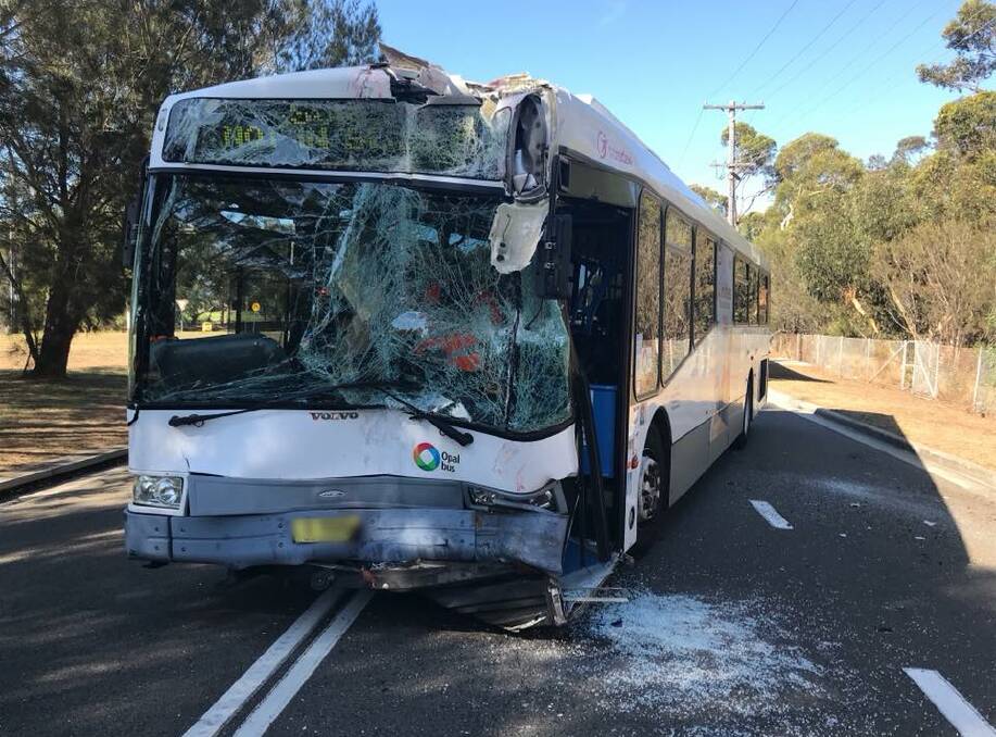 Buses collide: The crash scene on Old Illawarra Road near Blaxland Road at Illawong. Pictures: Menai Fire Station