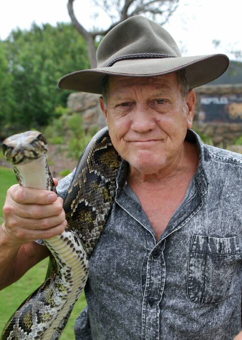 Snake alive: David Ireland at the Symbio Wildlife Park, Lawrence Hargrave Drive, Helensburgh. Ireland has written a new book. Picture: John Veage