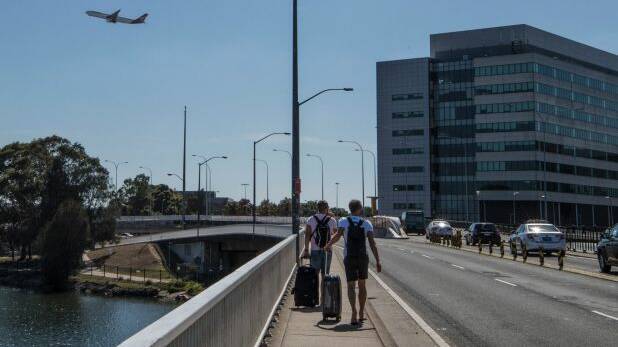 By walking to the airport from nearby Wolli Creek, Tom and Andrew made savings of over $27. Photo: Louise Kennerley
