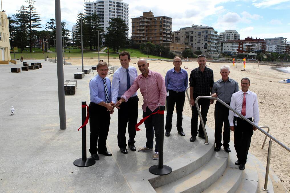 Cutting red tape: The official opening of The Esplanade at Cronulla. Mayor Steve Simpson, MP Mark Speakman, Councillor Hassan Awada and the project team. Picture : Lisa McMahon