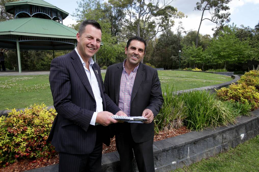 We will remember: Menai Chamber of Commerce president Andrew Manson (left) with deputy mayor Carmelo Pesce on the spot where Menai's first Anzac memorial is to be built in time for next year's Gallipoli centenary. Picture: Jane Dyson