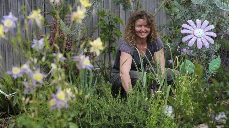 Verity Alexandra at work in her wicking bed.
 Photo: Graham Tidy