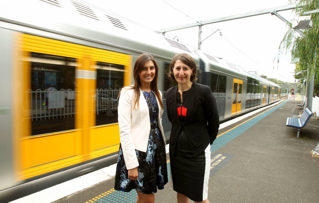 Smiles in public: Gladys Berejiklian and Eleni Petinos announce an upgrade of Jannali station during the election campaign.