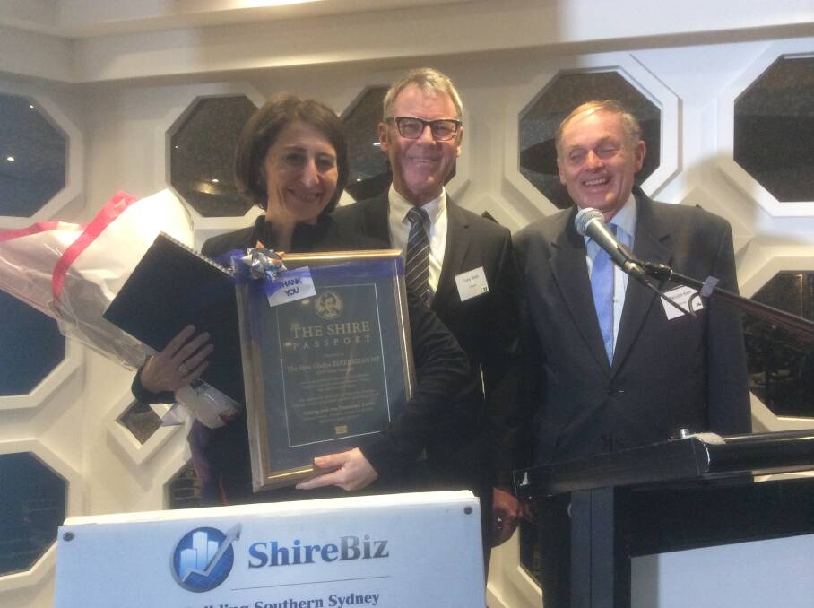 Safe entry: Gladys Berejiklian was presented with a "shire passport" by function organisers Tony Blaine (left) and former state MP Malcolm Kerr.