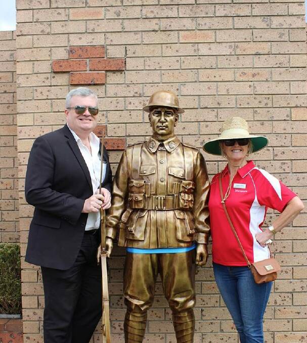 Heroes past: Woronora Memorial Park chief executive Graham Boyd and customer relations and training manager Carolyn Dowe with the Bronze Soldier.