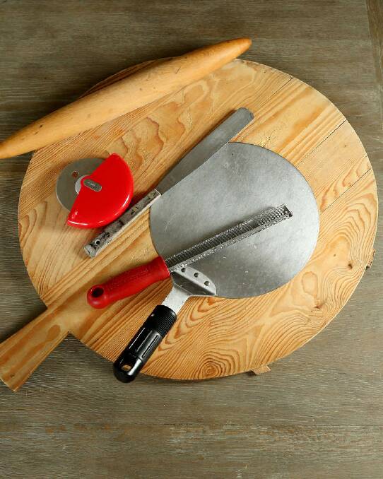 My toolkit: "I use a Thermomix for making my pizza dough (Kate uses it for soups and, occasionally, mango ice-cream). Otherwise my essential tools include my Zyliss pizza chopper, a wooden rolling pin (which I use for my pizza bases on our stainless steel bench), a Microplane for my cheeses and my wooden paddle." Photo: Pat Scala