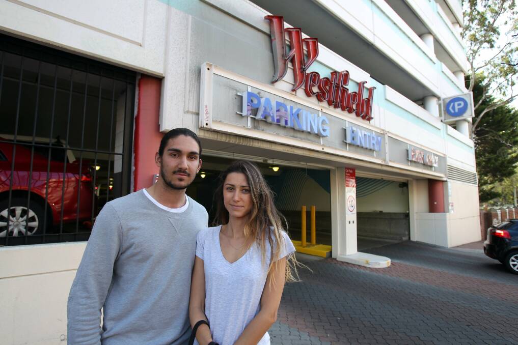 Parking: Marcus Taylor and Bella Cass have diffdering views about paid parking at Westfield Miranda. Picture Chris Lane