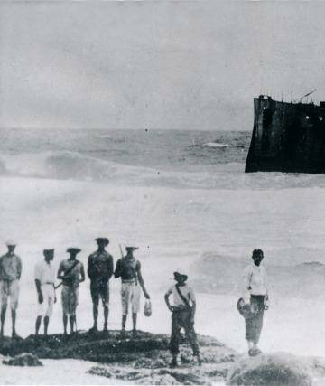 VICTORY AT SEA: The German raider Emden "beached and done for" following her defeat at the Cocos Islands by HMAS Sydney on November 9,1914. Photo: Australian War Memorial