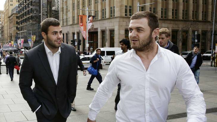 Sharks circling: Wade Graham and Nathan Gardner leave a meeting with their lawyers in Pitt St. Photo: Jessica Hromas/Getty Images