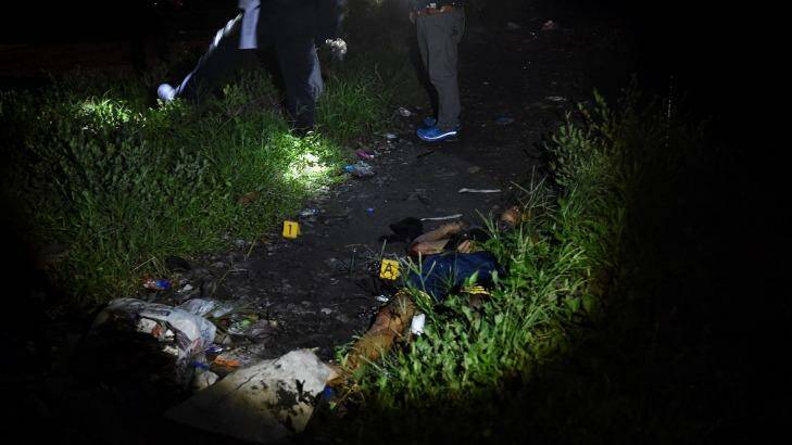 The body of one of the alleged drug dealers in Manila, Philippines.  Photo: Kate Geraghty