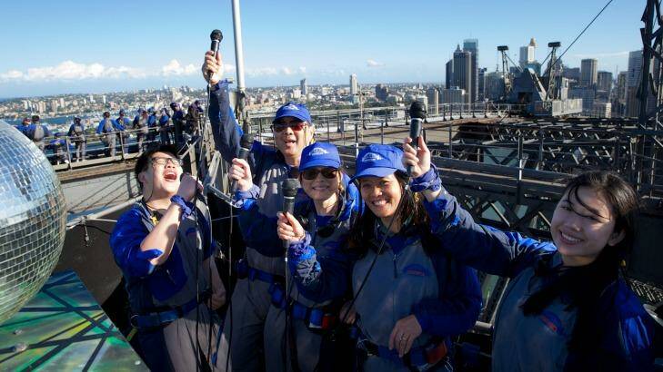 On top of the world: Chinese tourists will be able to ring in the start of their new year by singing karaoke on summit of the Sydney Harbour Bridge.
 Photo: Wolter Peeters