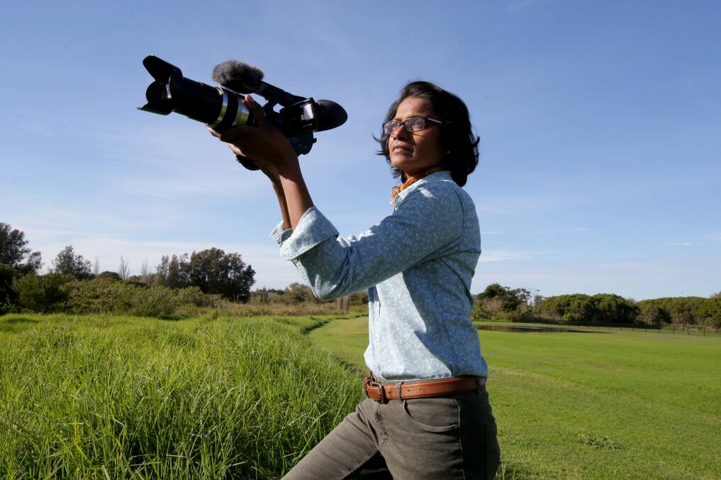 Handle with care: Sumi Skellam in Patmore Swamp at Kogarah, part of the F6 road reservation which is the subject of her documentary film, The Corridor. Picture: Jane Dyson