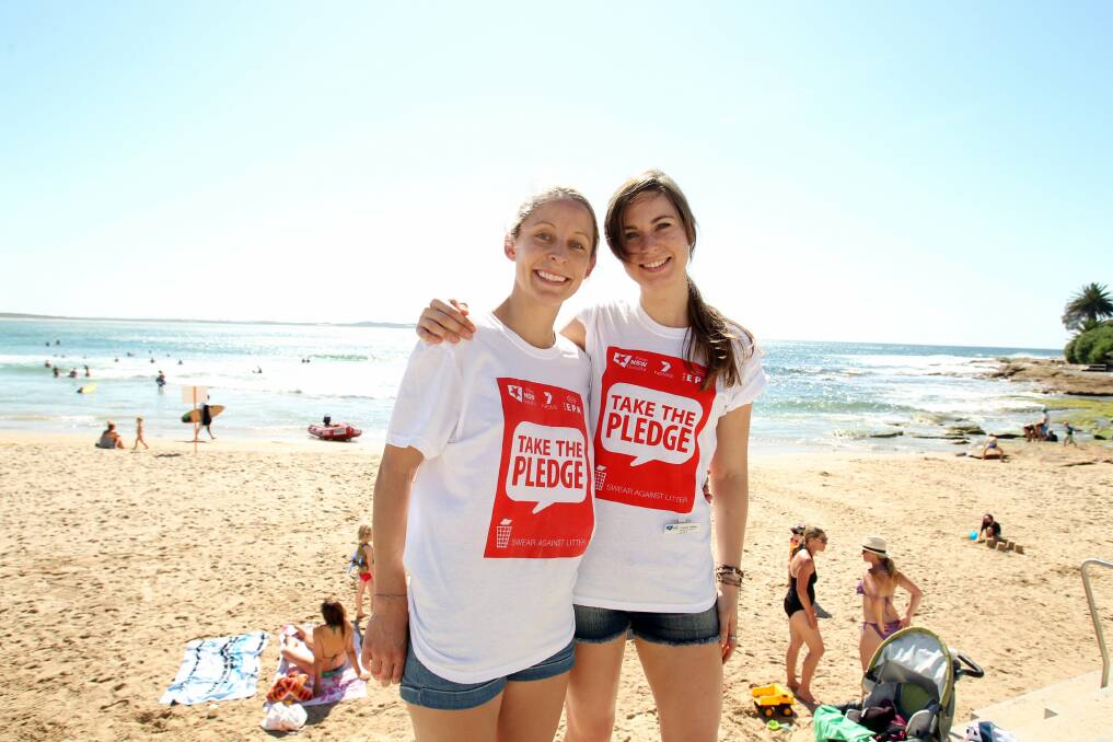 Personal awareness: Laura Oxley (right) and Briony Manion at Cronulla beach for the launch of the "Take the Pledge" anti-litter campaign. Picture: Chris Lane