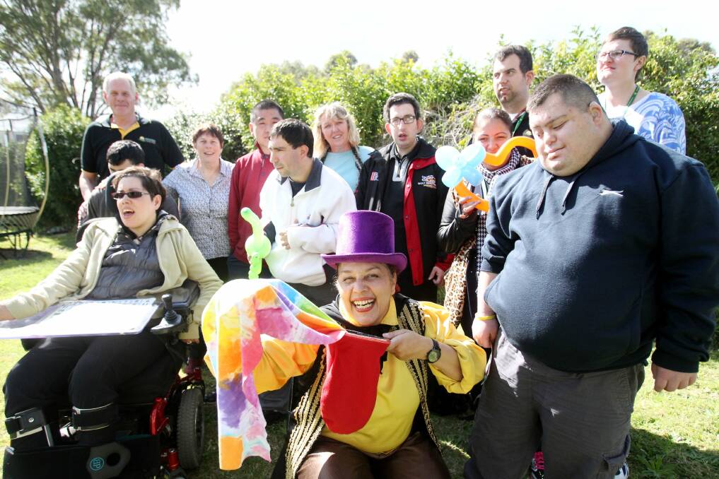 Amazement: Magic Jeanie entertains clients and staff at Sunnyhaven's open day. Picture Chris Lane