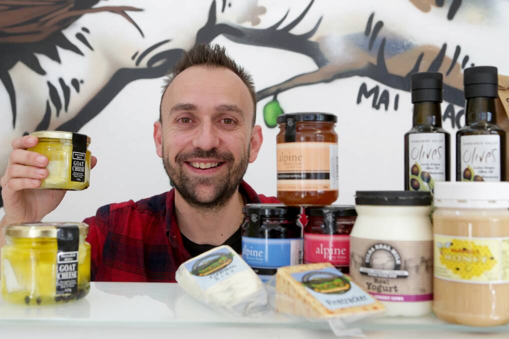Tasty treats: Rockdale Coffee will host a fresh food market day on Saturday. Pictured is Swallow Coffee owner Peter Bosevski. Picture: Jane Dyson