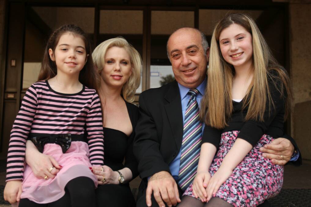 Moving on: Jack Jacovou, pictured with wife Jenny and daughters Jessica and Rosalie in 2012 when he became Hurstville's mayor.