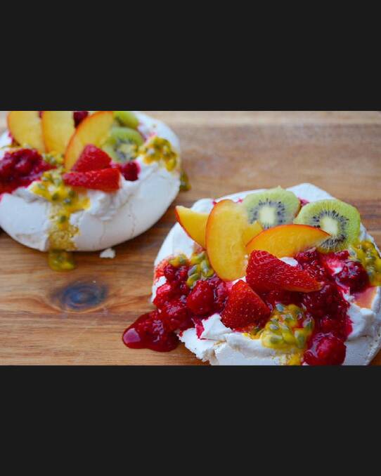 'My twist on the Australia Day Pav ... vegan pavlova with whipped vanilla bean coconut cream and topped with a rustic raspberry coulis, fresh passion fruit, kiwi, nectarine & strawberry!' Photo: Facebook/Jessica Lauren Ting