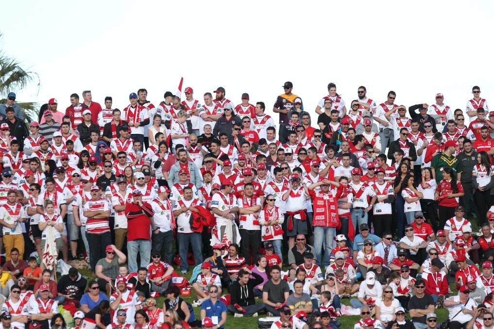 Red and white army: The Dragons' faithful on the hill at Kogarah Jubilee Oval. Picture: Chris Lane