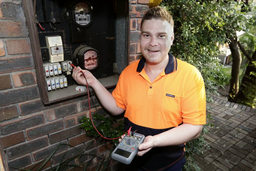 Bright spark:  Adrian Scott is studying at TAFE to become an electrician. He featured in a 1990 Leader article (below) about his interest in electronics. Main picture: Anna Warr

