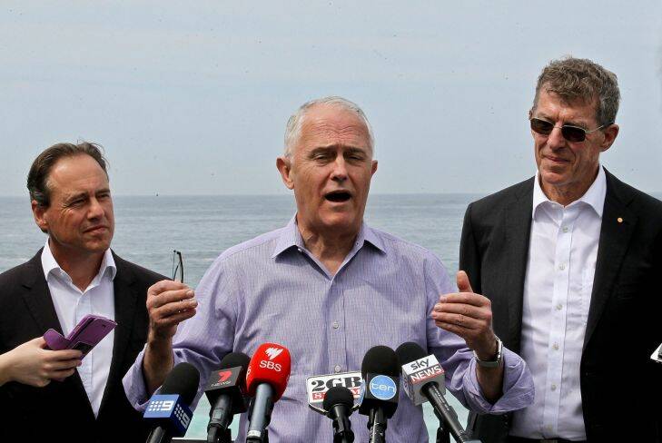 SYDNEY, AUSTRALIA - OCTOBER 8:  Prime Minister Malcolm Turnbull pays a visit to North Bondi SLSC to promote the introduction of a new updated cervical canncer drug GARDASIL 9 for the Human Papillomavirus to be introduced to teenagers.Pictured with Health minuster Greg Hunt on the left and Dr Ian Frazer on the right on October 8, 2017 in Sydney, Australia.  (Photo by Ben Rushton/Fairfax Media)
