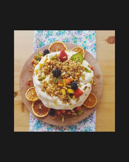 Pavlova for breakfast: 'This is my 'Breakfast Pavlova' a traditional pavlova topped with Greek yoghurt, homemade toasted granola with coconut and golden syrup (tastes like Anzac biscuits guys) topped with a mix of yummy fruits, and of course passionfruit!' Photo: Instagram/@laurenthelovecat