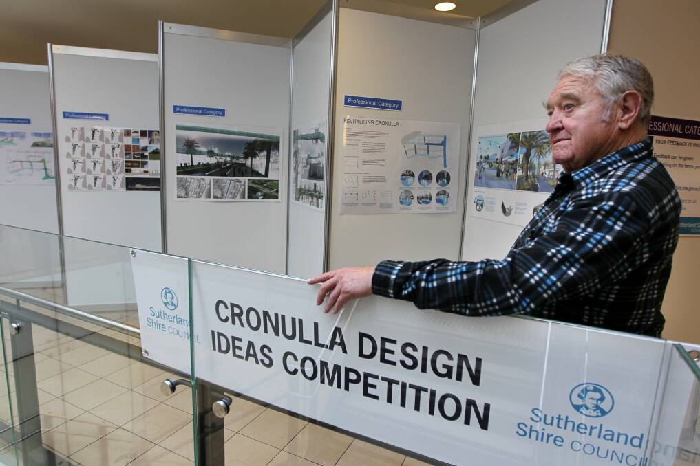 New ideas: Architect Graham Smith looking at Cronulla Design Ideas Competition entries. Picture John Veage
