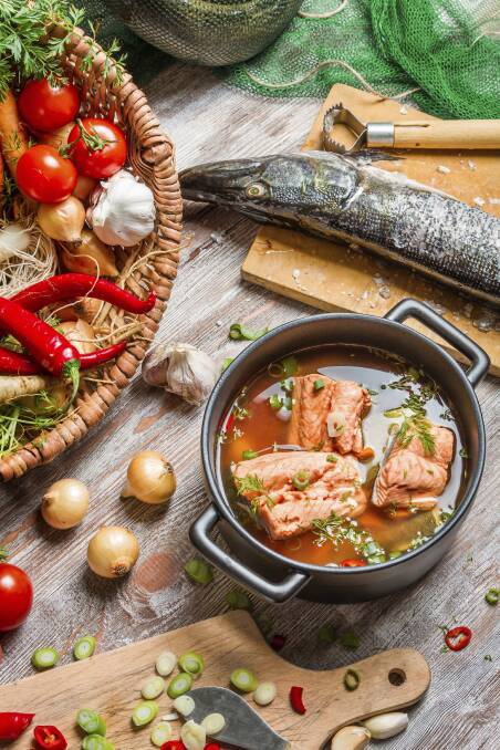 Freshly caught fish and vegetables for soup ingredients Mediterranean diet