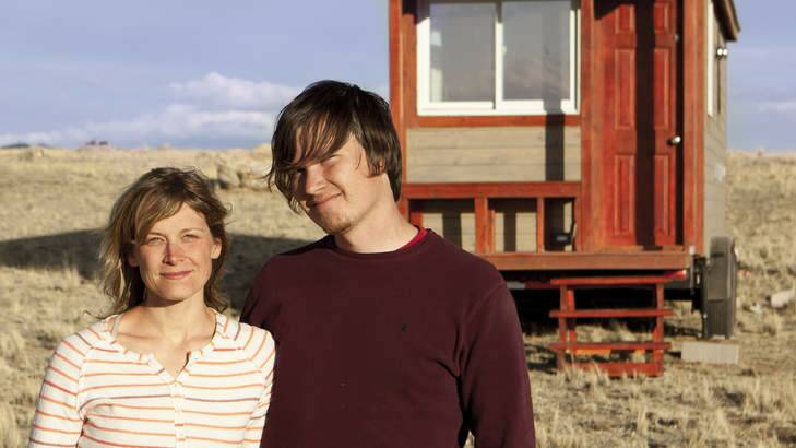 Christopher Smith and Merete Mueller outside their 11.5-square-metre abode. Photo: Kevin Hoth