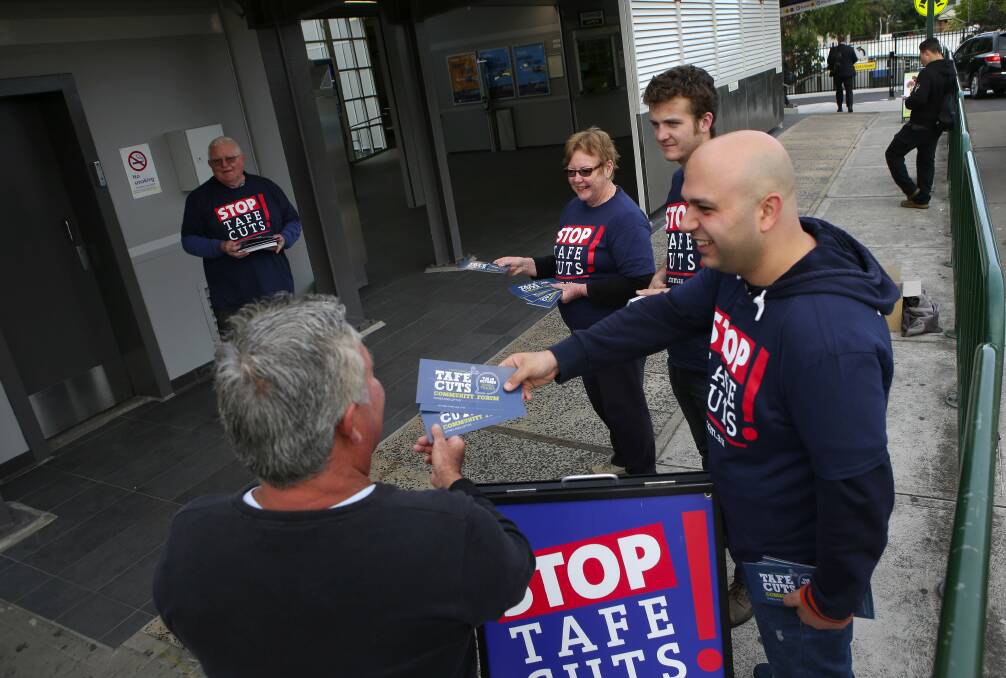 Cuts claim: Shire Community Union Alliance members, at Sutherland railway station, hand out leaflets advertising a public forum on TAFE "cuts". Picture:John Veage