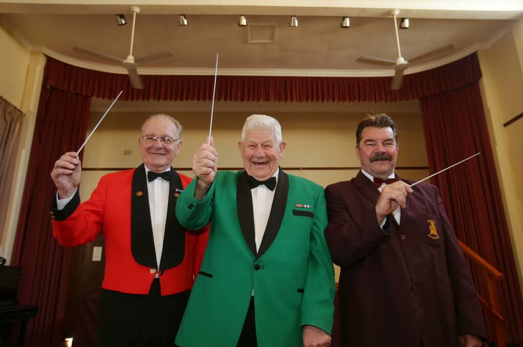 Batons at the ready: (from left) Band masters Ian Bown, Edgar Starr and Barry Davidson will lead their bands in a Anzac concert tribute. Picture: Chris Lane