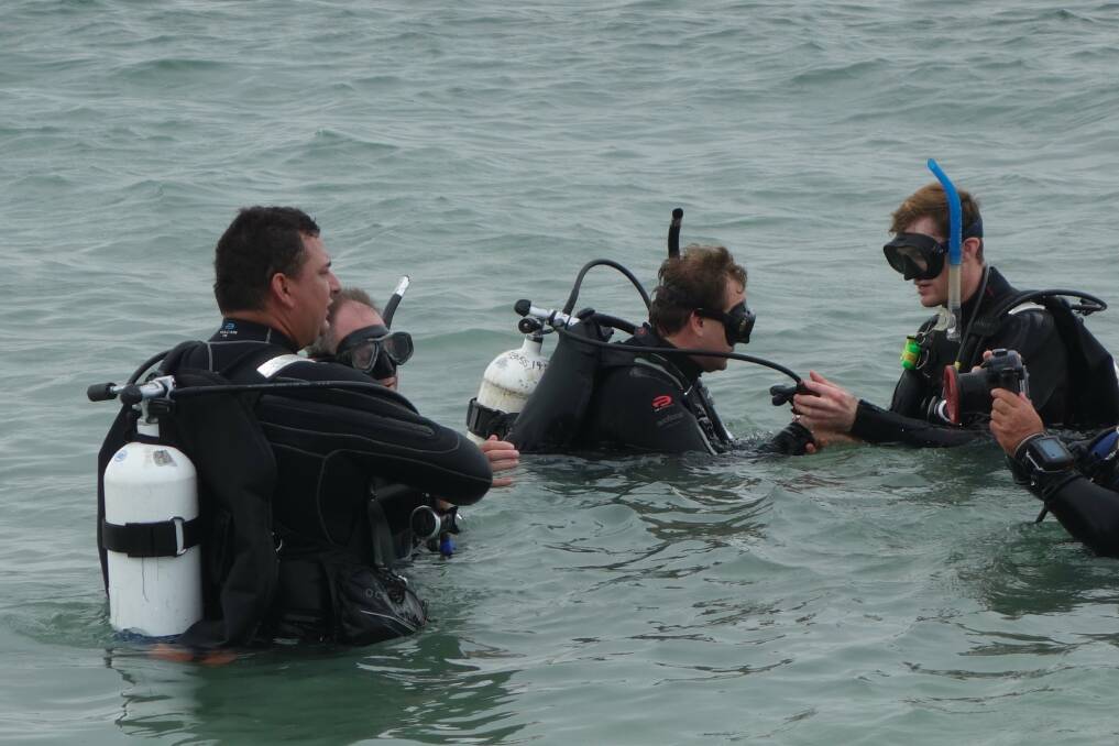In safe hands: Scuba diving experts assist the learners.