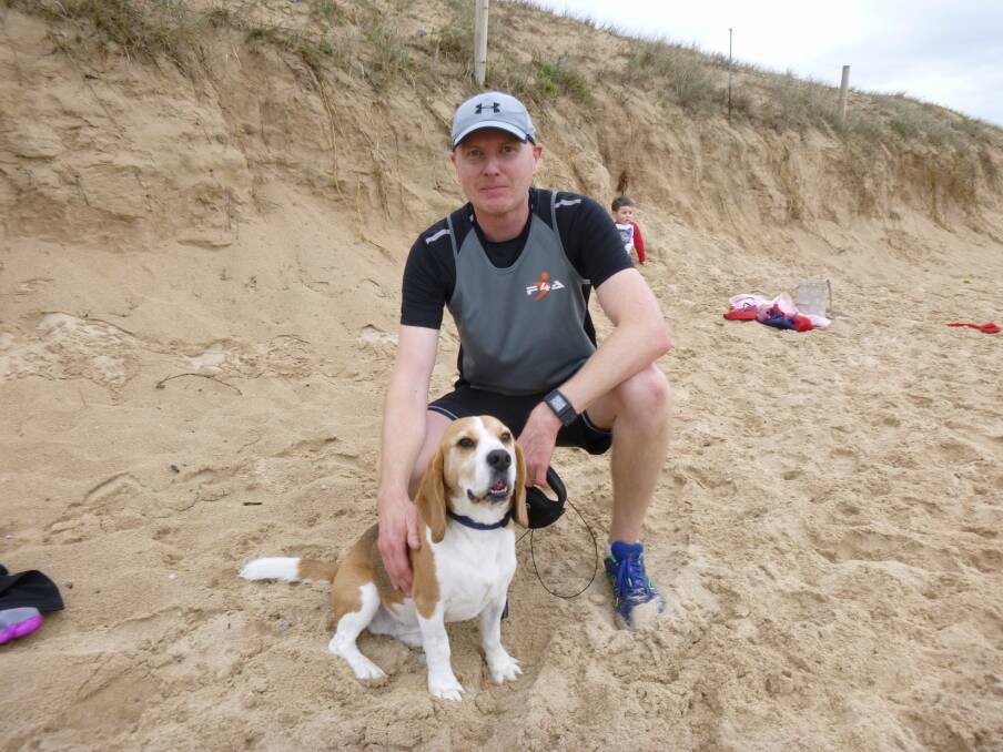 David Coulter and his beagle Angus. Picture: Chris Lane

