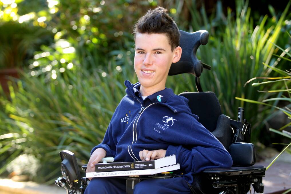 Going strong: University student Daniel Michel does not let his disability get in the way of higher education. Picture: Chris Lane