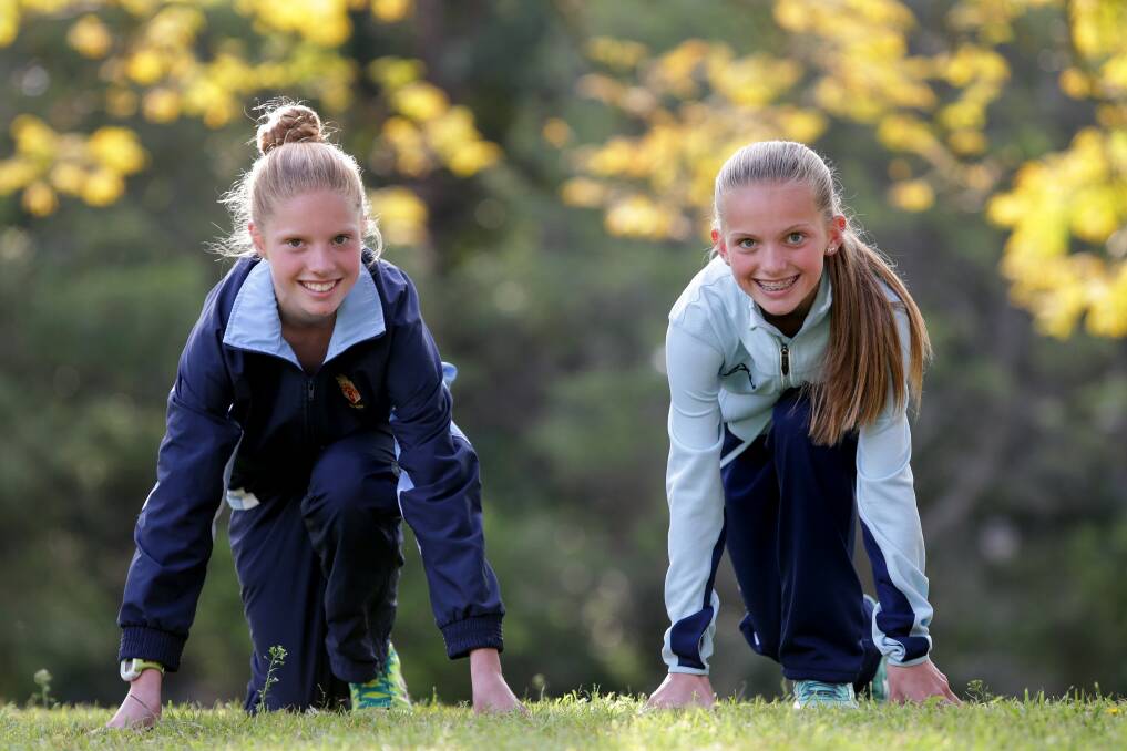 Speedy sisters: Bundeena girls Emily (left) and Tayla Schneider will compete in the Australian Cross Country Championships this weekend. Picture: Jane Dyson