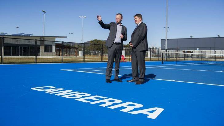 Tennis ACT chief executive Ross Triffitt, right, is turning over every blade of grass to bring the Davis Cup to Canberra. Photo: Rohan Thomson