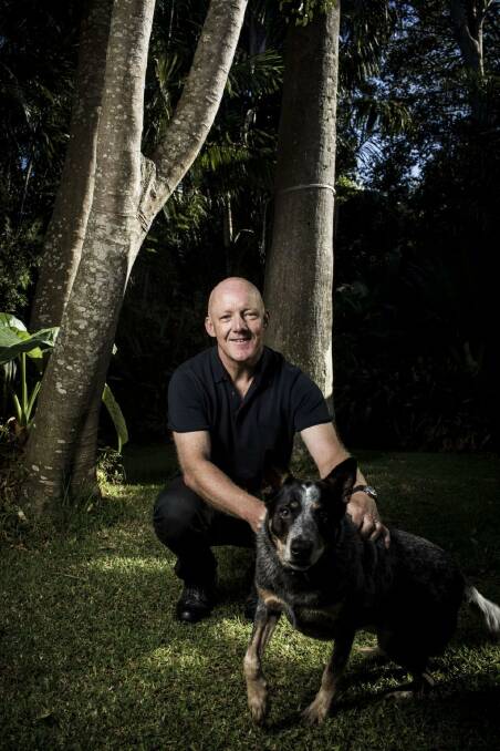 Malcolm Knox with Bruce his blue heeler-kelpie cross, at home in Sydney Photo: Dominic Lorrimer