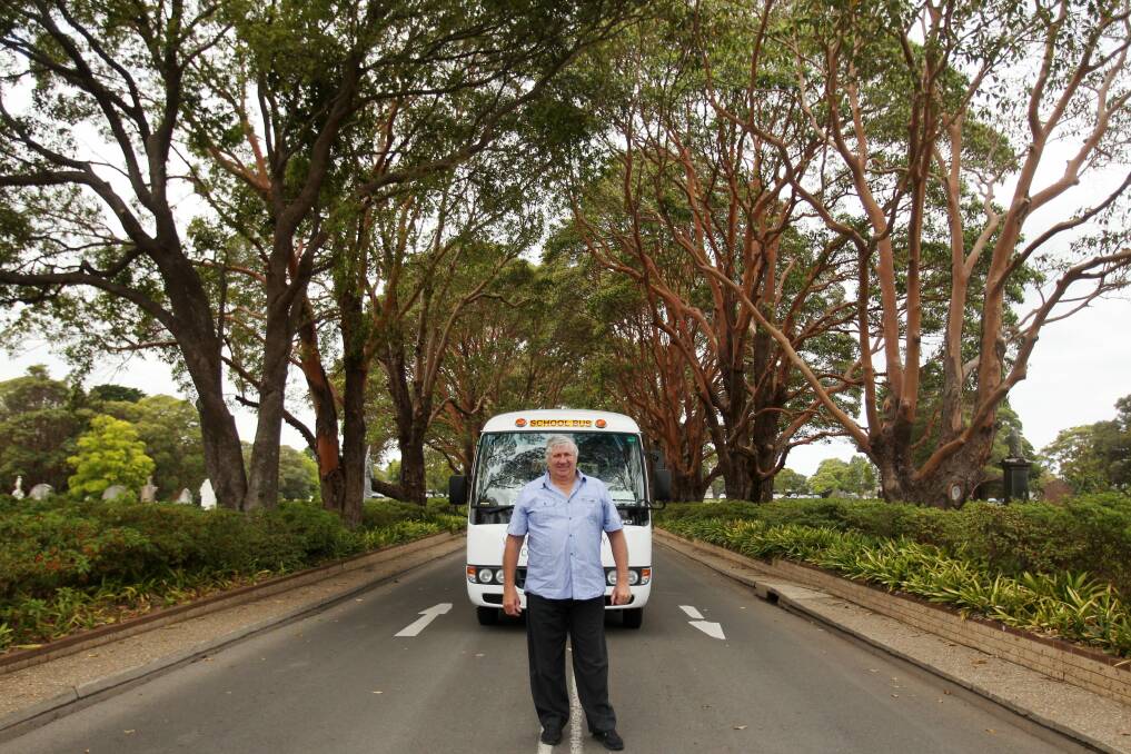Hard road made easier: Allan Barnes has been driving the Woronora Cemetery-run shuttle bus service for six years. He has just taken delivery of a new bus to continue the service. Picture: Chris Lane