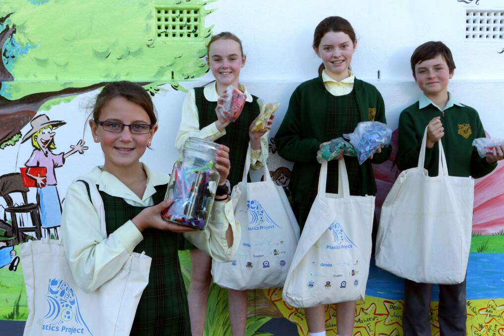 Say no to plastic: Pupils Gemma Clarke, Tamsin Smith, Sommerset Lawler and Reef Iredale go green for their school. Picture: Jane Dyson