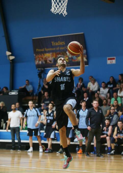 Outstanding star: Basketballer Reece Craigie in action for the Sutherland Sharks. Picture: Chris Lane