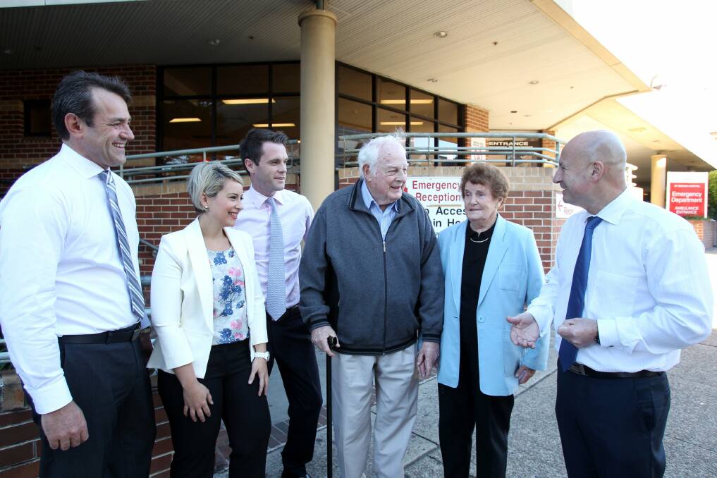 Health pledge: John Roberston(right) with Labor candidates Steve Kamper, O'Bray Smith, Chris Minns with Betty and Merv Evers at St George Hospital, where he promised funds for redevelopment. Picture: Chris Lane